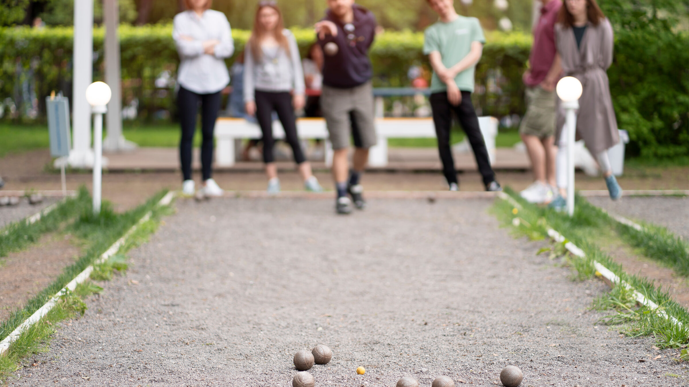 friends,playing,petanque,guy,through,a,ball