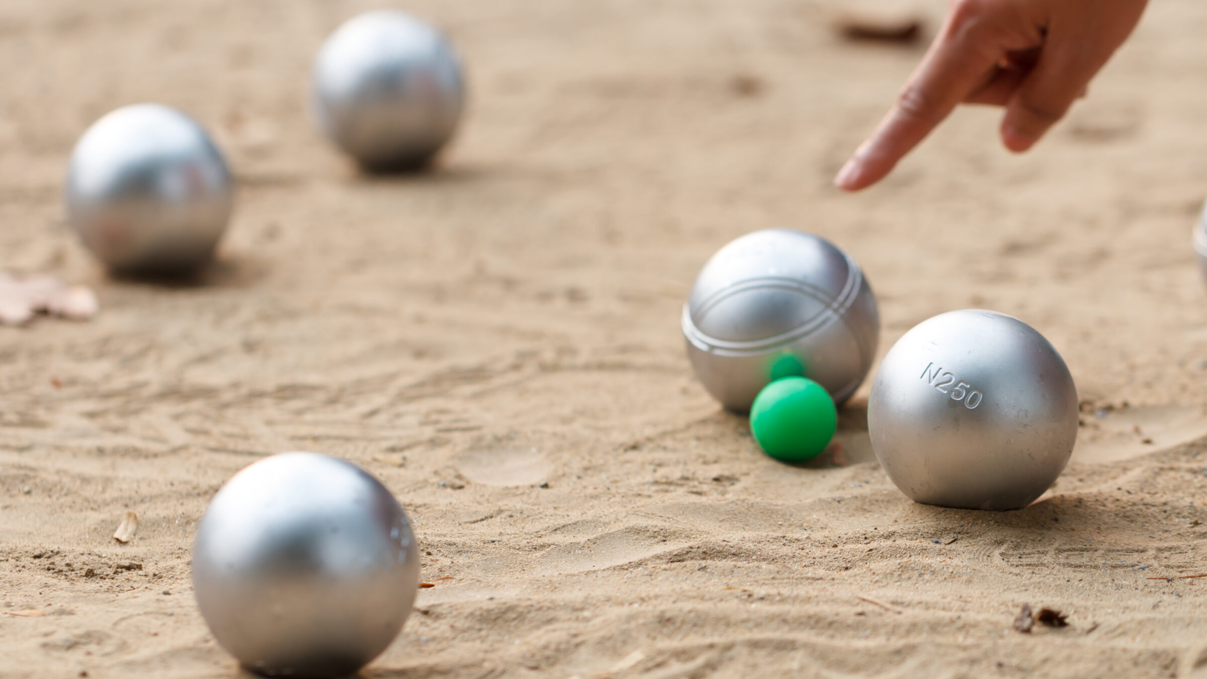 boule,ball,or,petanque,in,match,with,hand,of,female